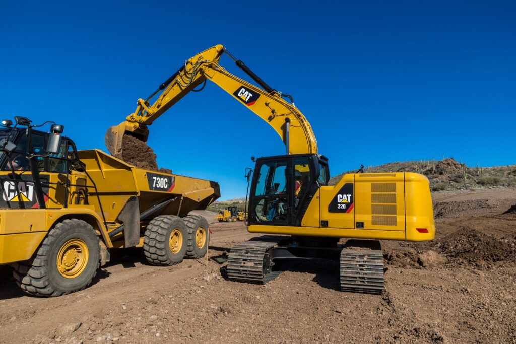 CAT 320 excavator with digging bucket for utility, excavation, and infrastructure projects