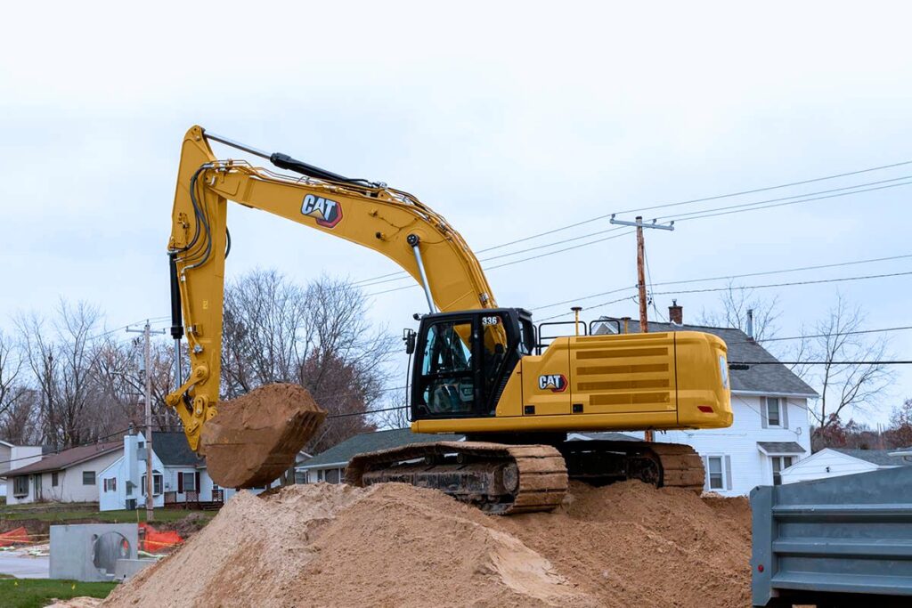 CAT 336 excavator positioned outdoors for excavation, utility, and infrastructure projects